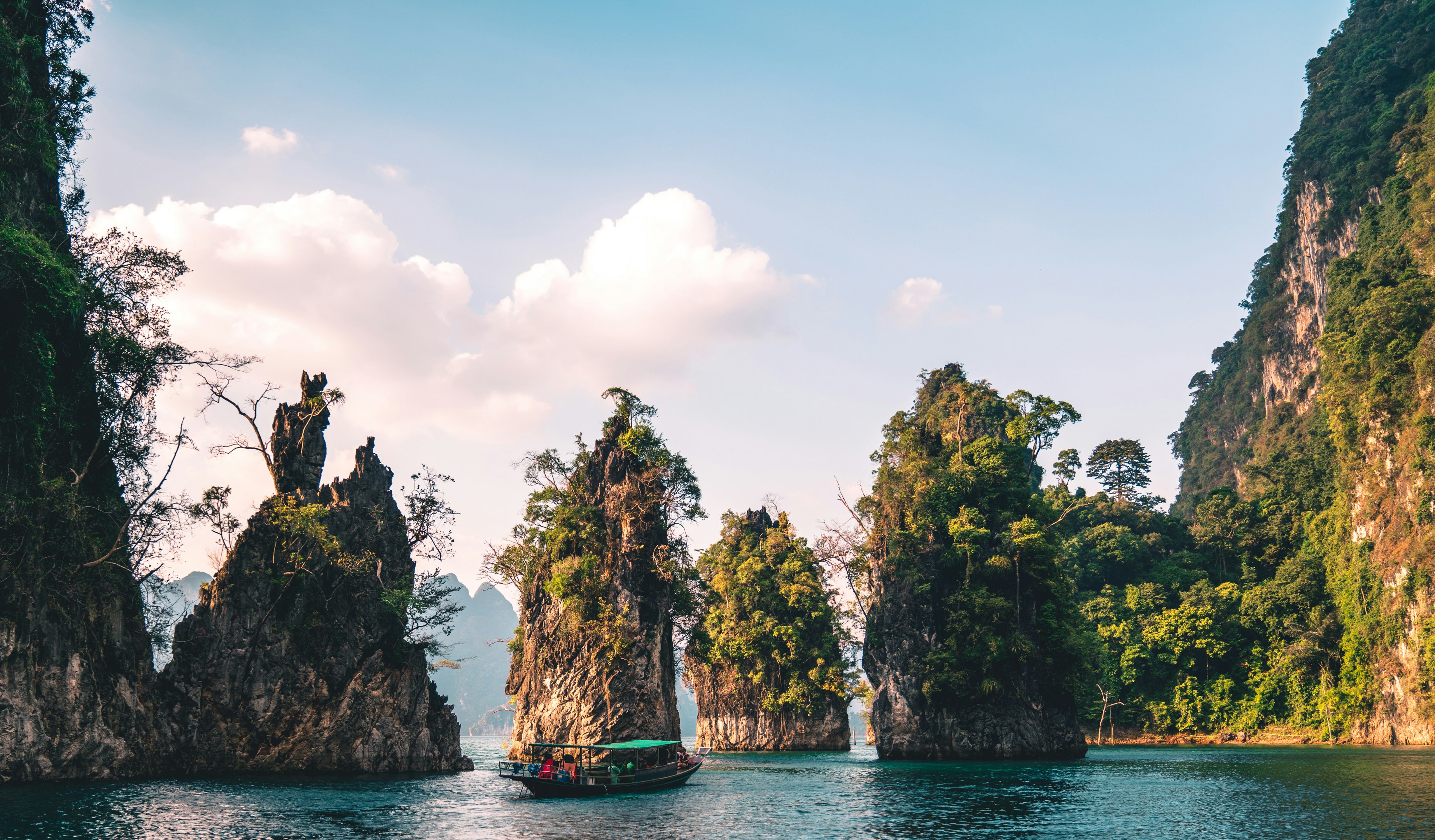 scenery of rock formation on body of water